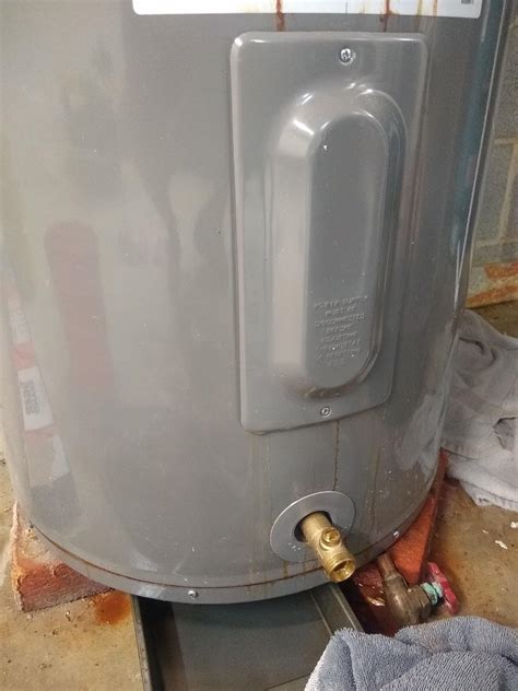 Rheem Water Heater Leaking from Side Panel: Causes, Fixes,。